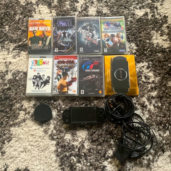 PSP Bundle with 7 games + case and extra disc holder and TV cables